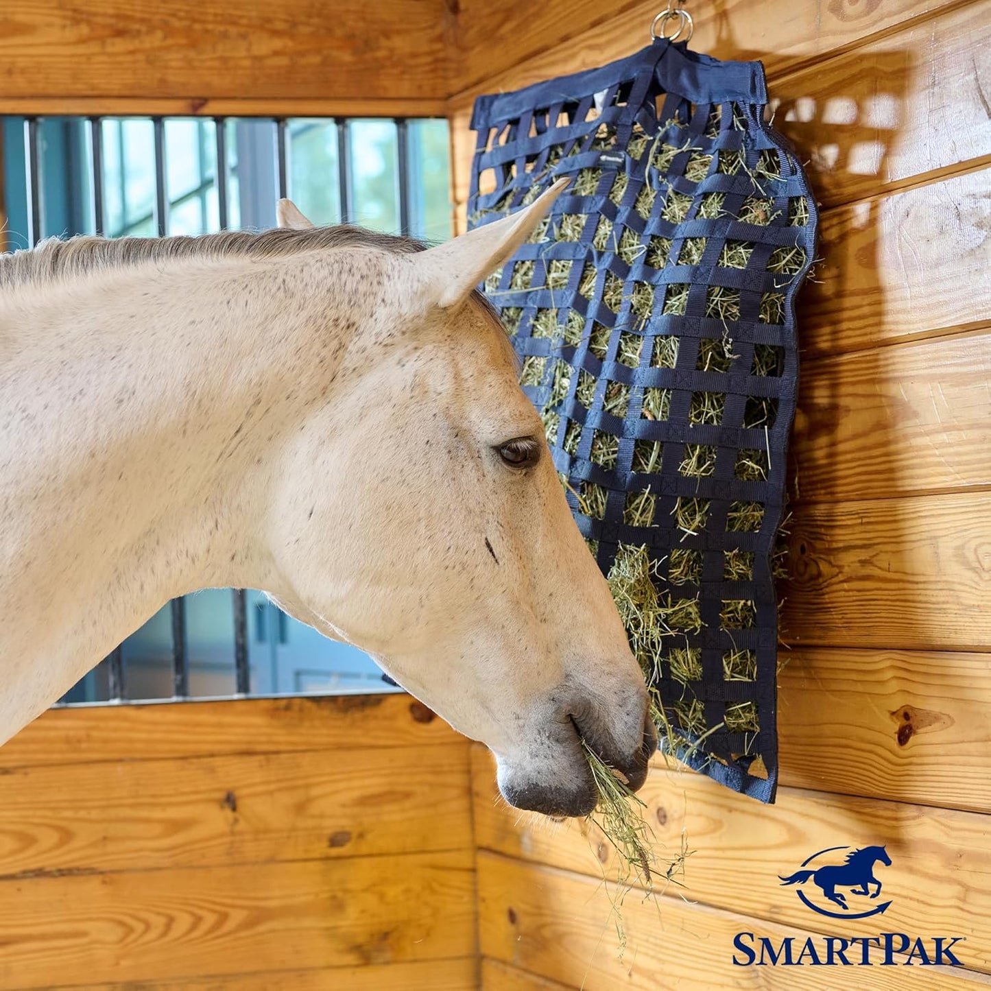 SmartEquine Slow Feed Hay Bag for Horses | Hay Feeder Net with Resistant Nylon | Gator Mouth Enclosure for Easy Loading | Fits 10-15 lbs of Hay | 4 Flakes Bag | 37" x 30" | Navy Blue | 2" Holes